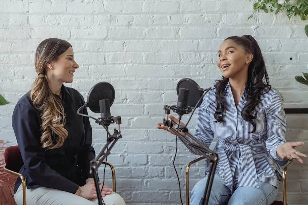 Host interviewing a PA on a podcast